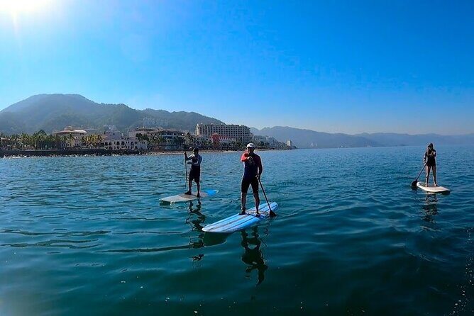 Stand Up Paddle Boarding Adventure in Puerto Vallarta - Photos, sunrise timing, and when the guide adjusts for waves