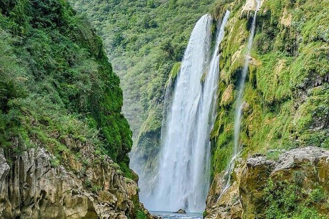 Tamul waterfall and water cave on a wooden canoe - Why this Tamul canoe day feels different from typical tours