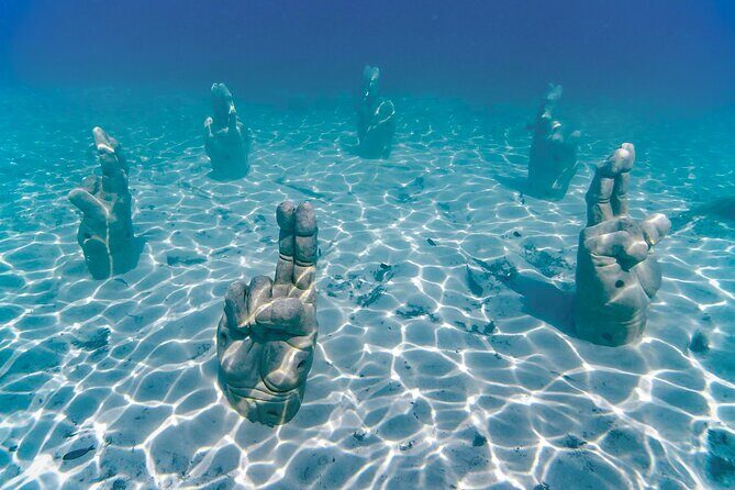 Top Isla Mujeres Catamaran Tour with Snorkel Open Bar and Buffet lunch - Cancun check-in: snacks, crew welcome, and the cruise ramp-up