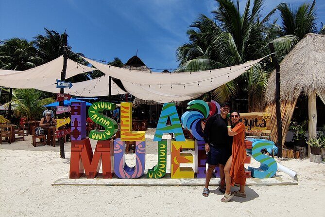 Top Isla Mujeres Catamaran Tour with Snorkel Open Bar and Buffet lunch - Stop 1 at El Meco Reef: snorkeling in 20–30 minutes