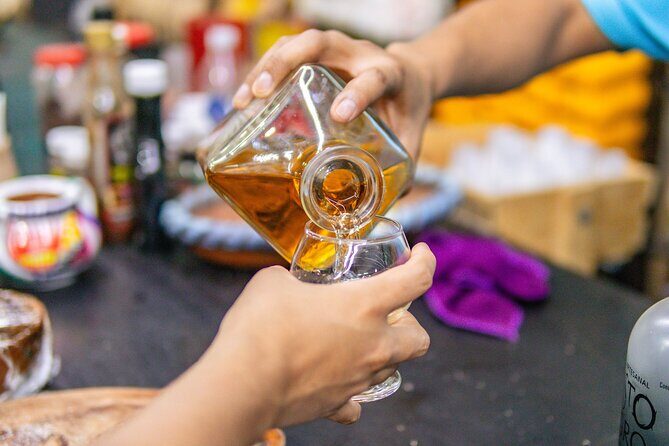 Tour in Huatulco and Playa La Entrega - Stop 3: Mezcal, chocolate, mole, quesillo, coffee, and grasshoppers