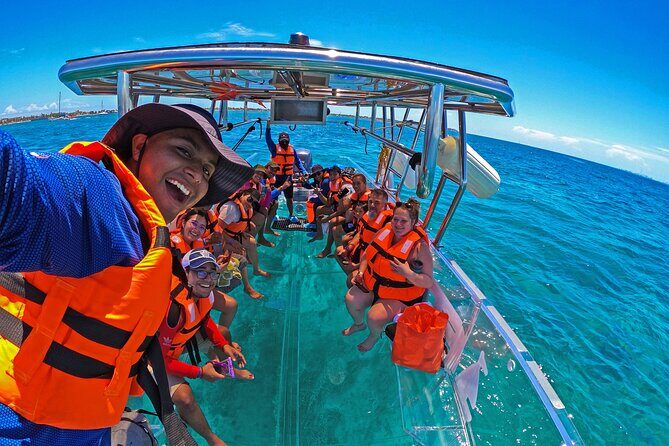 Tour Isla Mujeres excursion in Collective Transparent Boat - The Reef Route: La Cadenita, El Farito, and La Carbonera