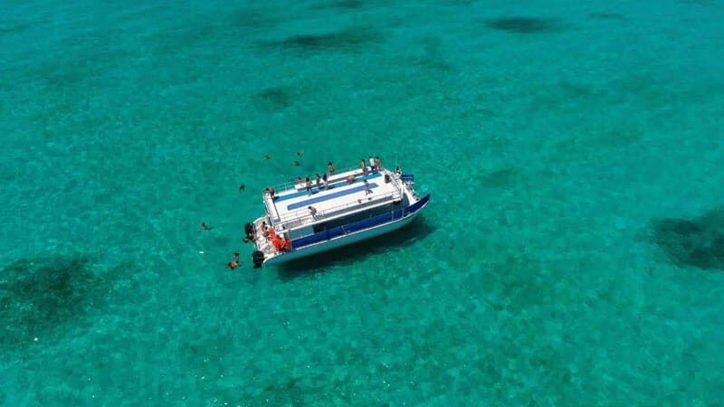 Tour Isla Mujeres: From Cancún-Riviera Maya all Included - Two-Deck Catamaran From the Puerto Juárez Area: Shade, Sun, Music, and a Bathroom