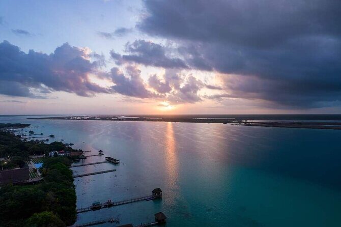 Tour of the Lagoon of Bacalar on pontoon -Collective- - Cenote de la Bruja: where the edge steals the show