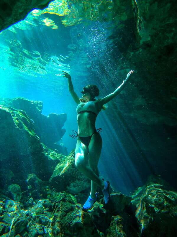 Tulum: Hidden Cenotes Bike Tour - Experience with Locals - Cenote Stop 2: Semi-Open Water and Sunlight Tricks
