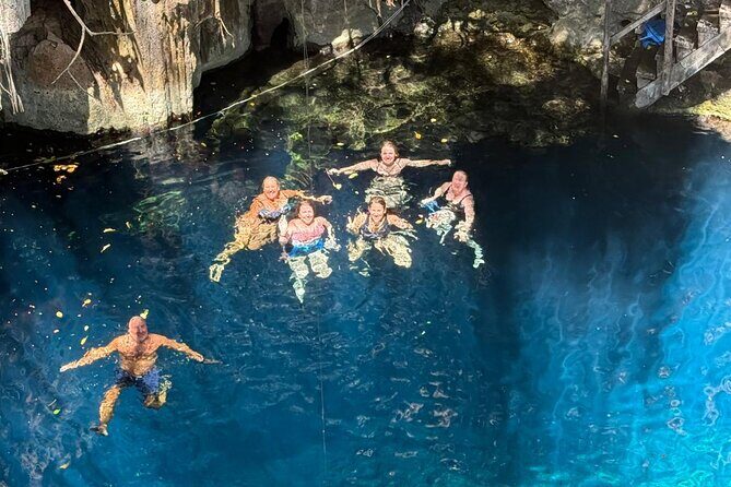 Uxmal, two Amazing Cenotes & Local Food Tour from Mérida - San Antonio Mulix cenote: cave formations, mineral drama, and turquoise water