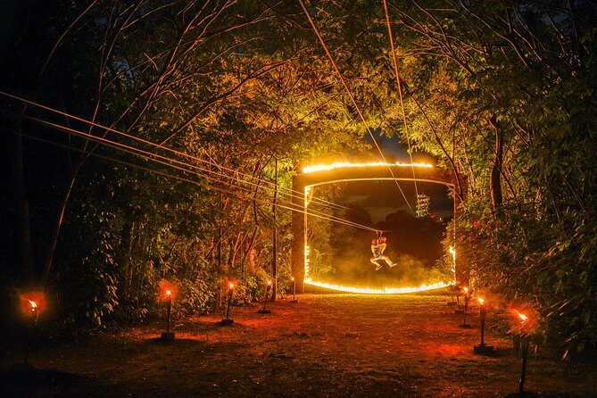 Xplor Fuego with Buffet Style Dinner and transportation - Zip lines at night: stars, treetops, and seven-line circuits